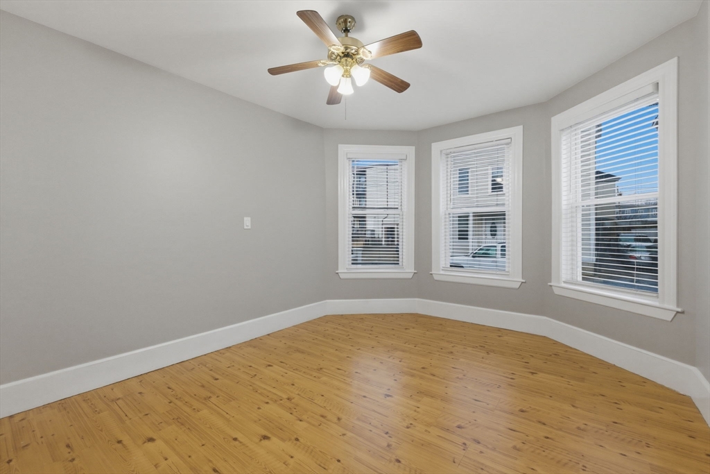 20 Bennett Street, Unit 1L Beverly, MA 01915 - Photo 13 of 22 a view of an empty room with a window