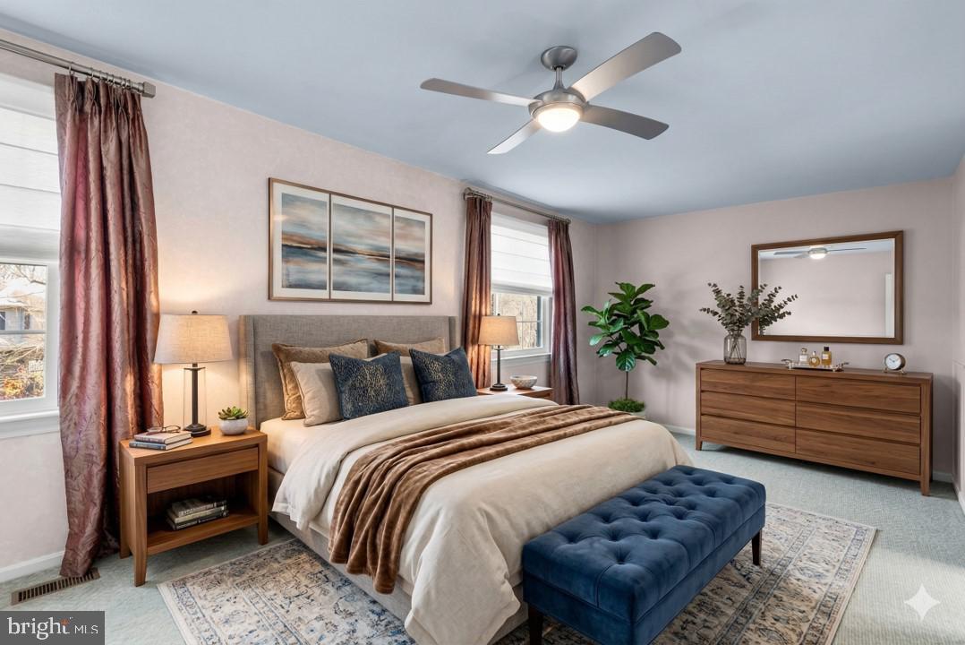 12633 English Orchard Court Silver Spring, MD 20906 - Photo 14 of 45 a bed room with a bed and a dresser