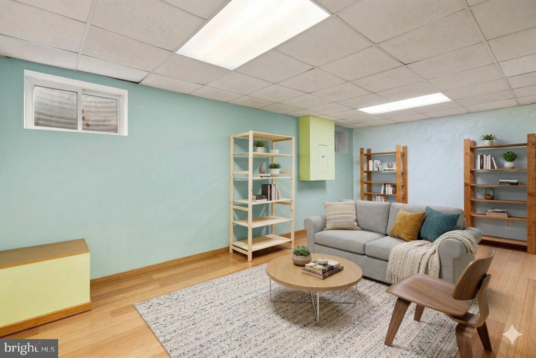 12633 English Orchard Court Silver Spring, MD 20906 - Photo 25 of 45 a living room with furniture and a rug