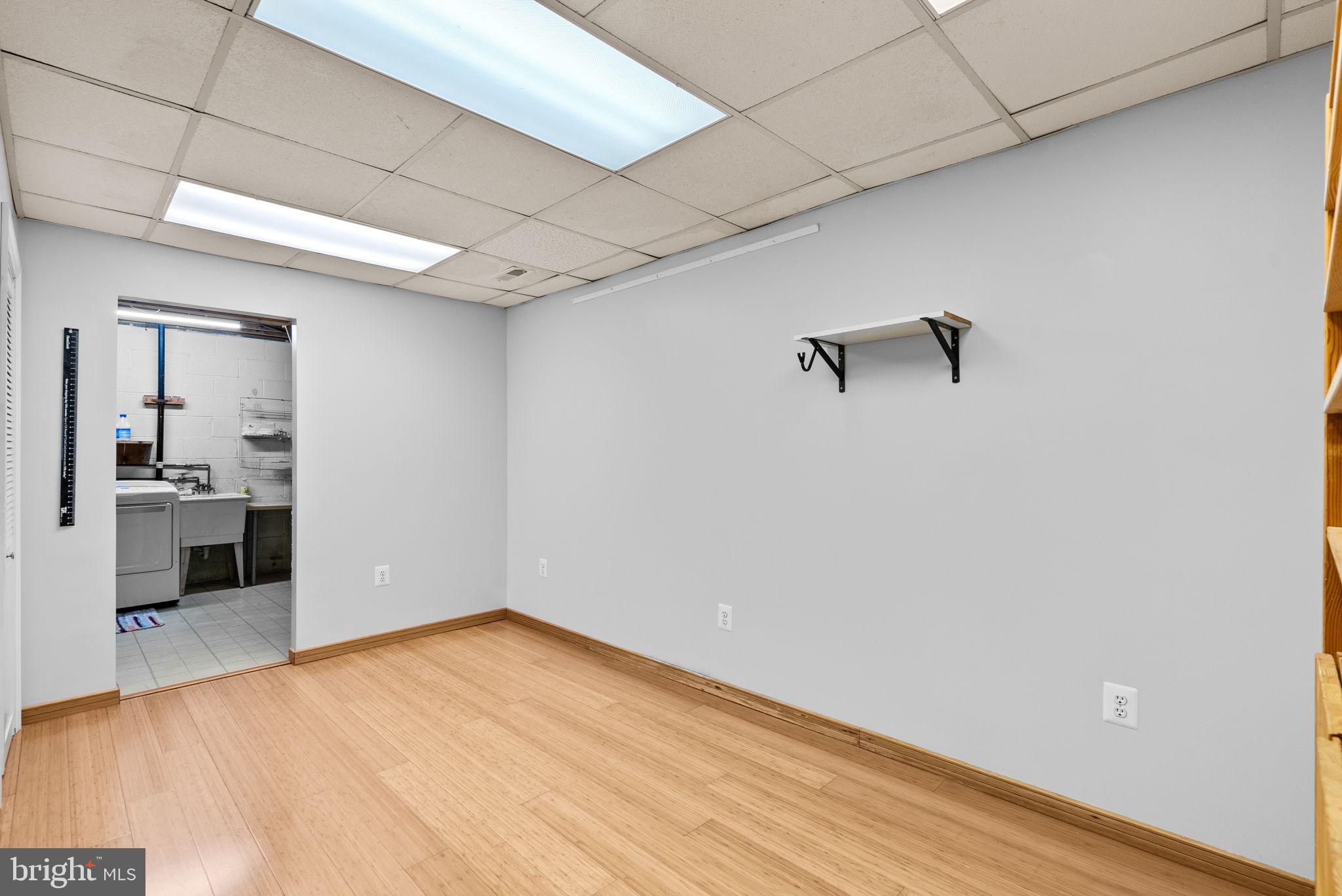 12633 English Orchard Court Silver Spring, MD 20906 - Photo 31 of 45 a view of empty room with wooden floor