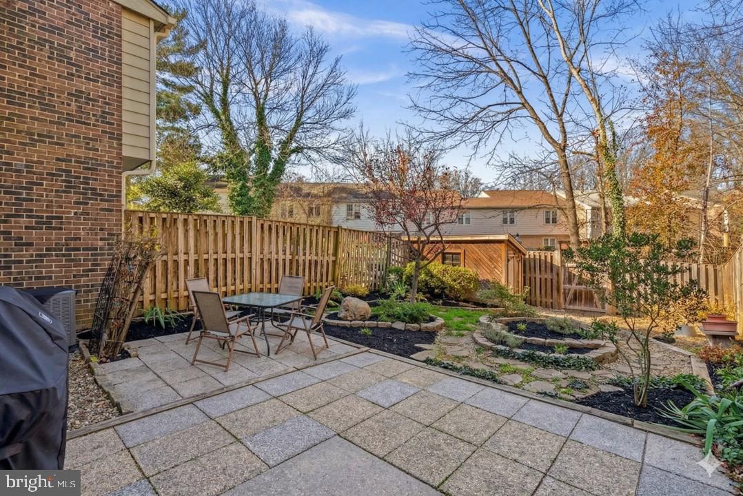 12633 English Orchard Court Silver Spring, MD 20906 - Photo 34 of 45 a view of backyard with patio and outdoor seating