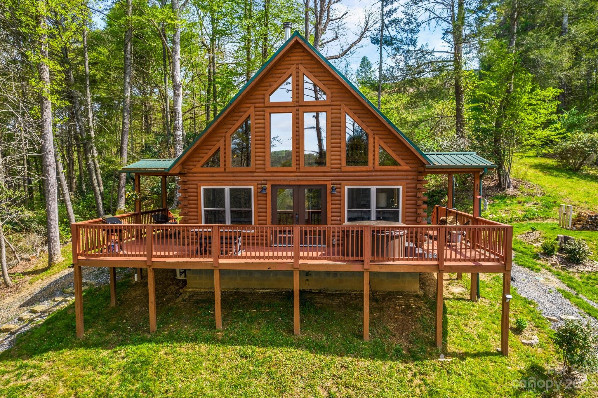 2023 Turnpike Road Marshall, NC 28753 - Photo 1 of 47 a backyard of a house with seating space