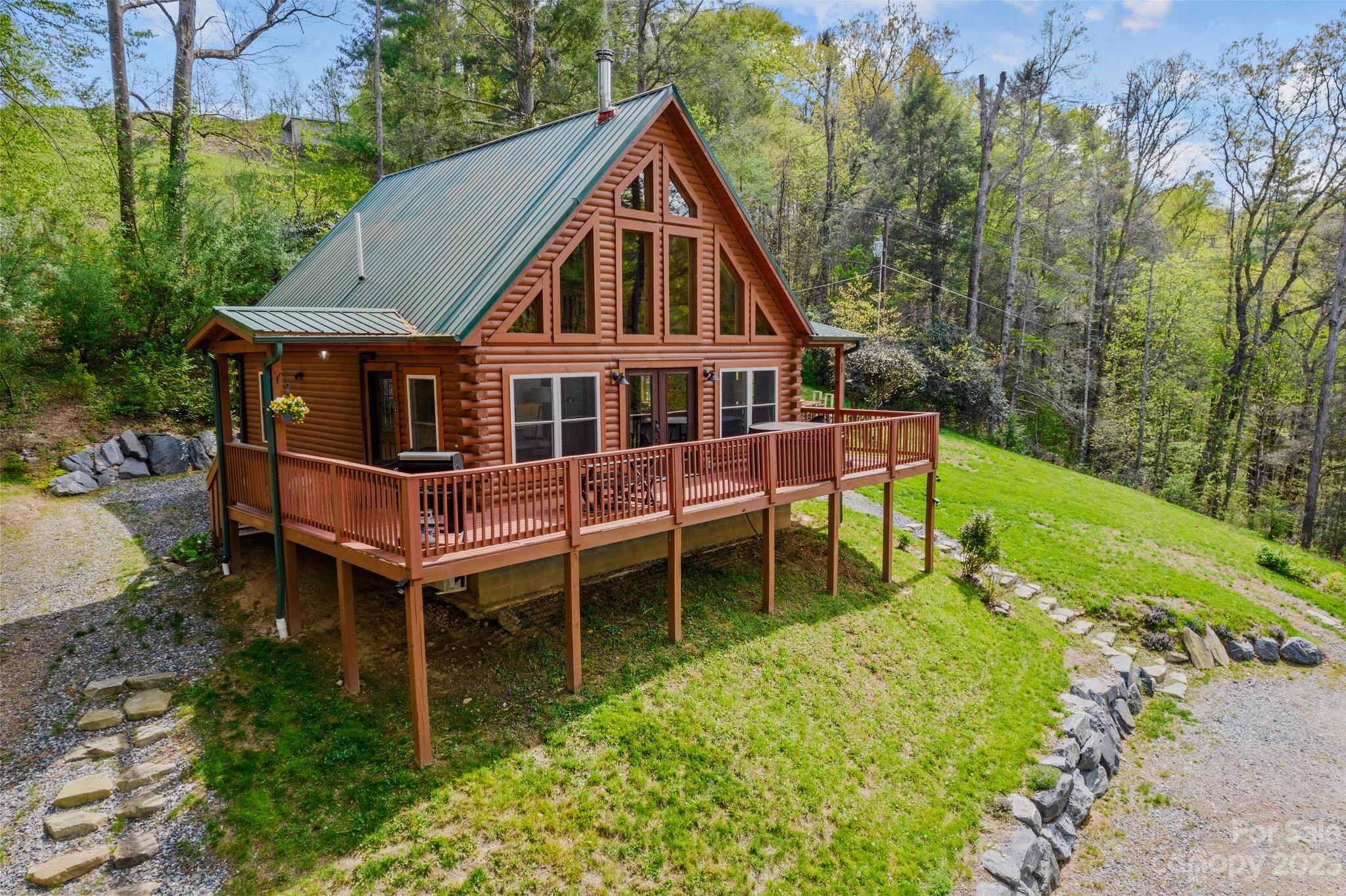 2023 Turnpike Road Marshall, NC 28753 - Photo 2 of 47 an aerial view of a house with a yard