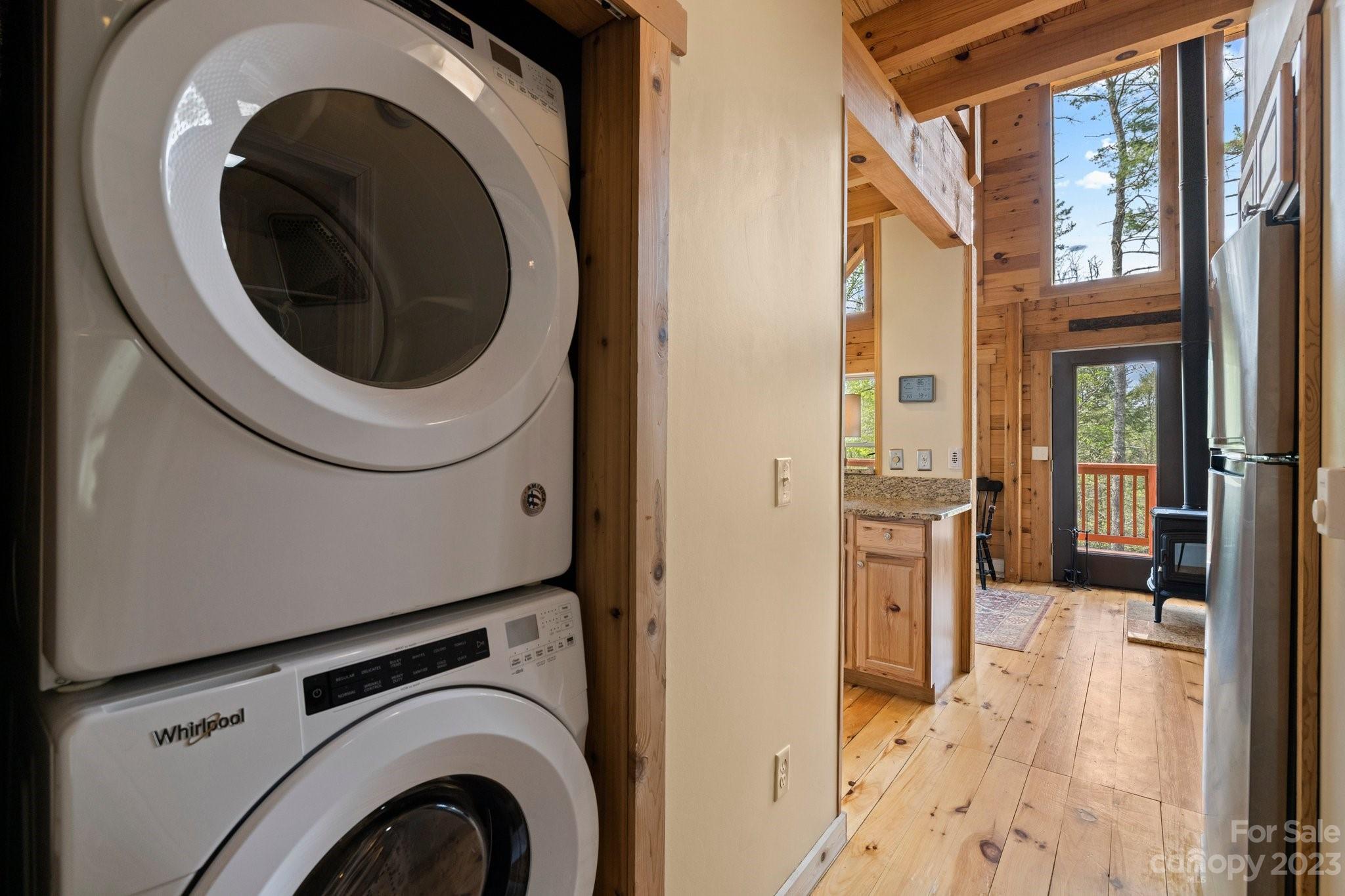 2023 Turnpike Road Marshall, NC 28753 - Photo 22 of 47 a view of a hallway with washer and dryer