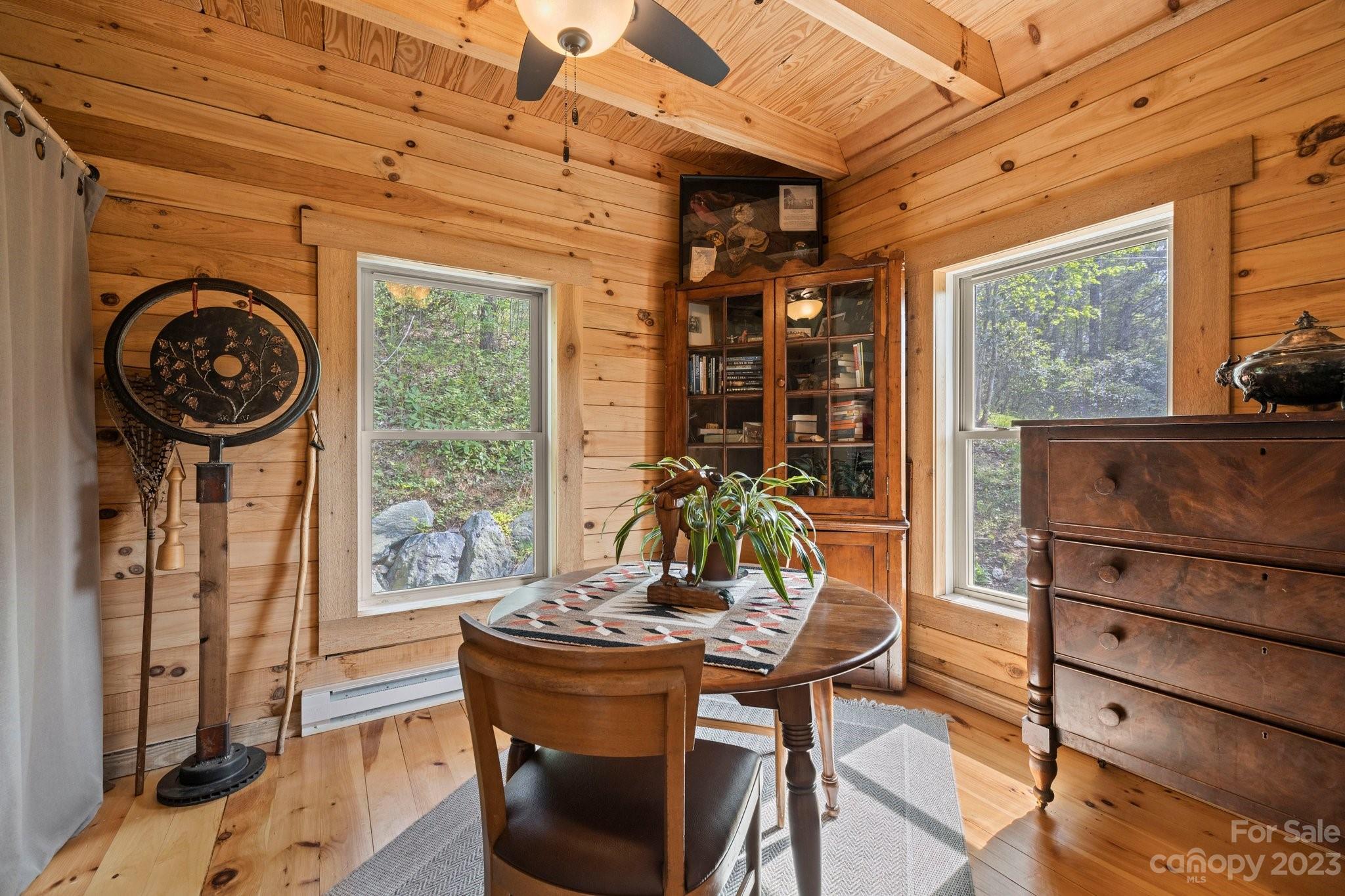 2023 Turnpike Road Marshall, NC 28753 - Photo 27 of 47 a view of a dining room with furniture window and outside view