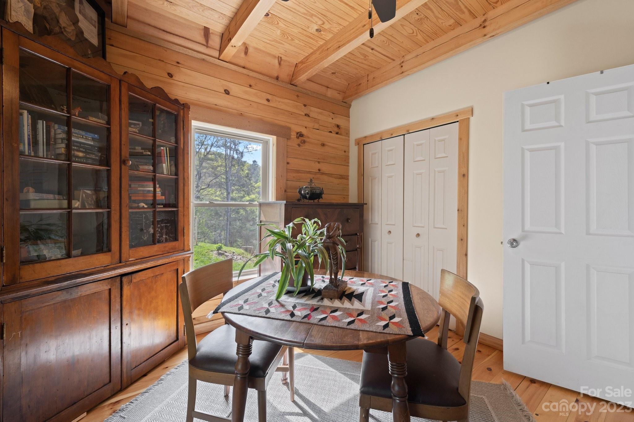2023 Turnpike Road Marshall, NC 28753 - Photo 28 of 47 a view of a dining room with furniture window and wooden floor