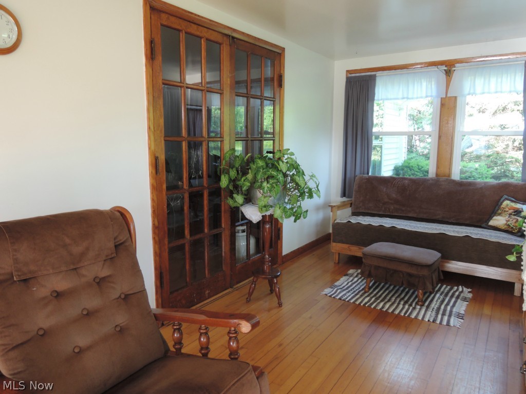 14122 Nash Road Burton, OH 44021 - Photo 4 of 19 French doors open from the living room to the family room.