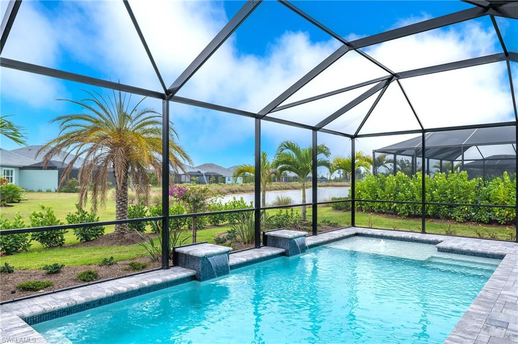 8914 Gustavia Court Naples, FL 34113 - Photo 11 of 23 a view of outdoor space with swimming pool