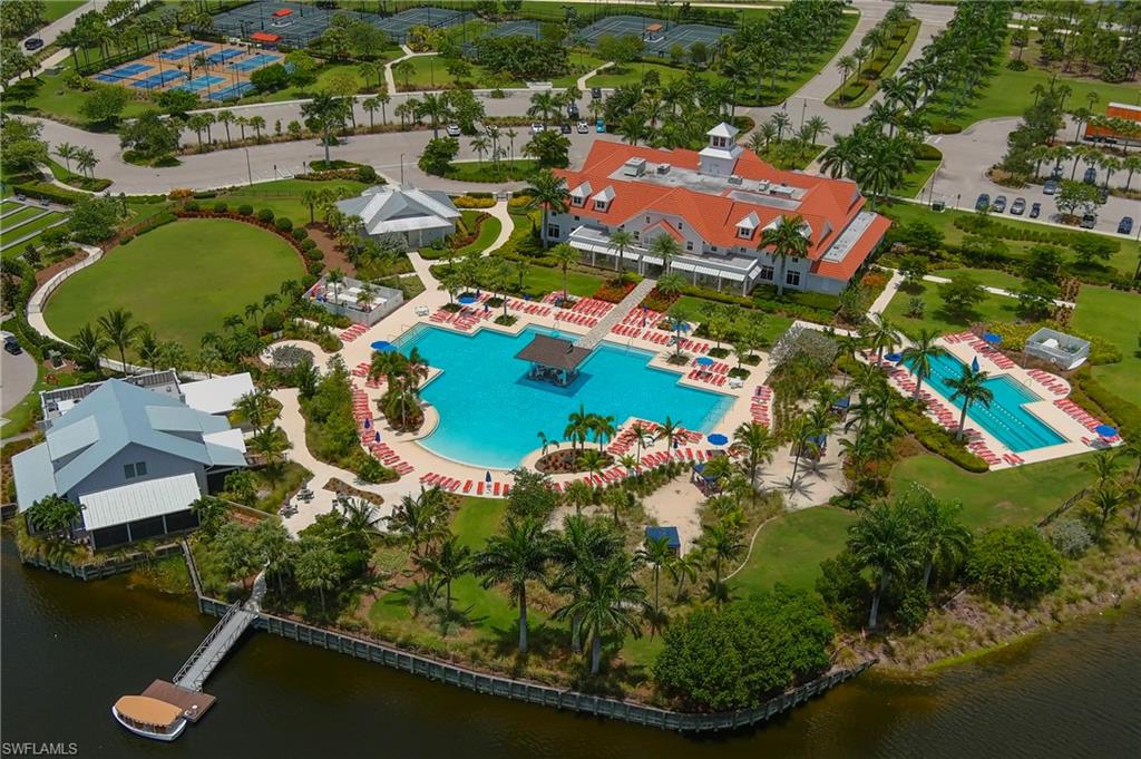 8914 Gustavia Court Naples, FL 34113 - Photo 15 of 23 an aerial view of residential houses with outdoor space and swimming pool