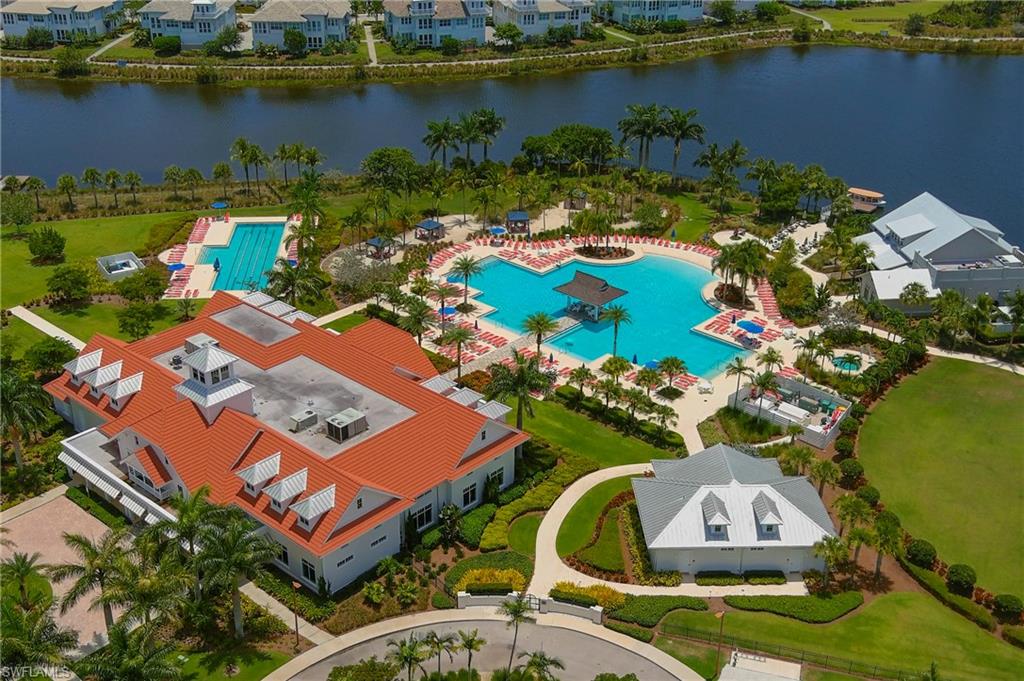 8914 Gustavia Court Naples, FL 34113 - Photo 17 of 23 an aerial view of a house with a lake view