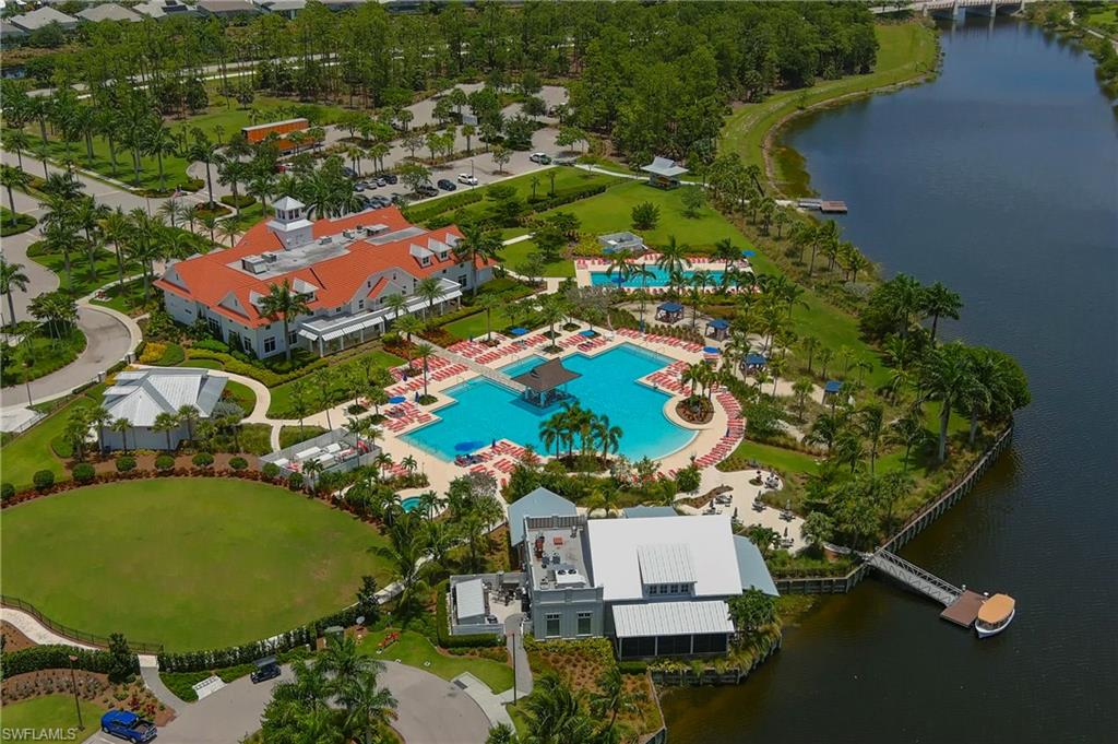 8914 Gustavia Court Naples, FL 34113 - Photo 18 of 23 an aerial view of a house with a swimming pool outdoor seating and yard