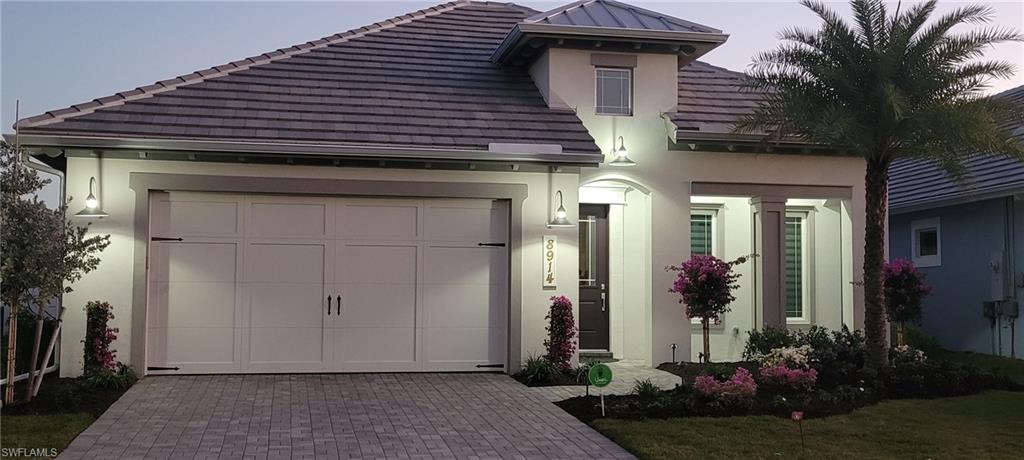 8914 Gustavia Court Naples, FL 34113 - Photo 2 of 23 a front view of a house