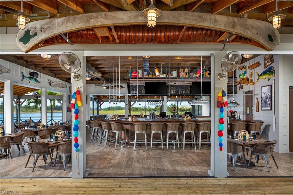 8914 Gustavia Court Naples, FL 34113 - Photo 21 of 23 a view of a restaurant
