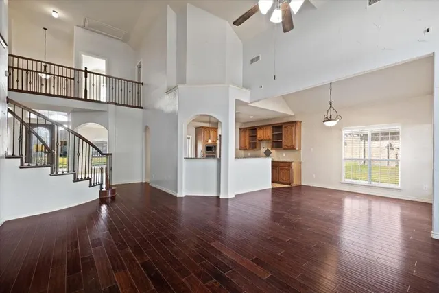 a view interior of a house with hallway and wooden floor