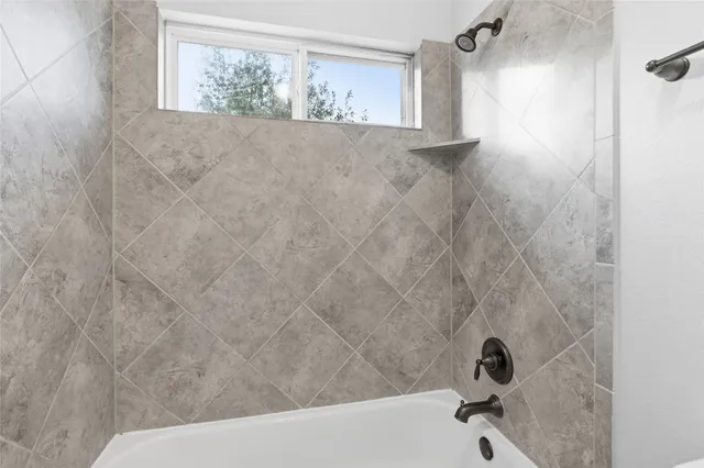 a bathroom with a bathtub