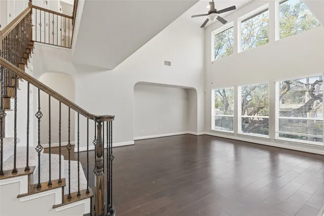 a view of an entryway with wooden floor