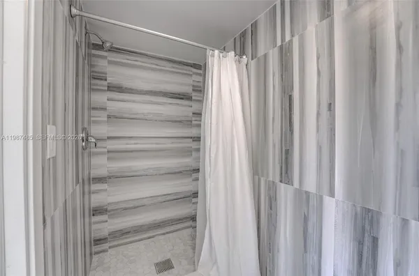 a view of swimming pool with outdoor seating