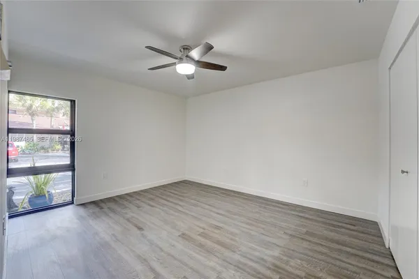 a view of storage and utility room with washer and dryer