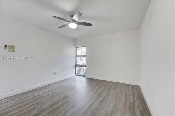 a view of swimming pool yard from a hallway