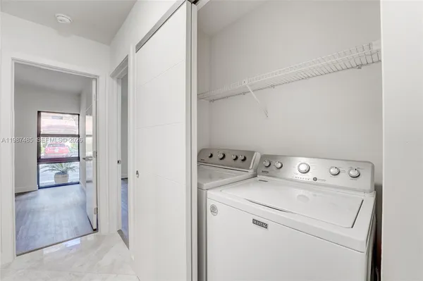 a view of a city with lots of trees