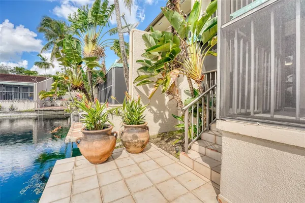 an aerial view of a houses with outdoor space
