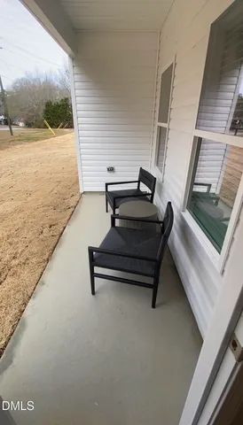 a view of sitting area with outdoor seating