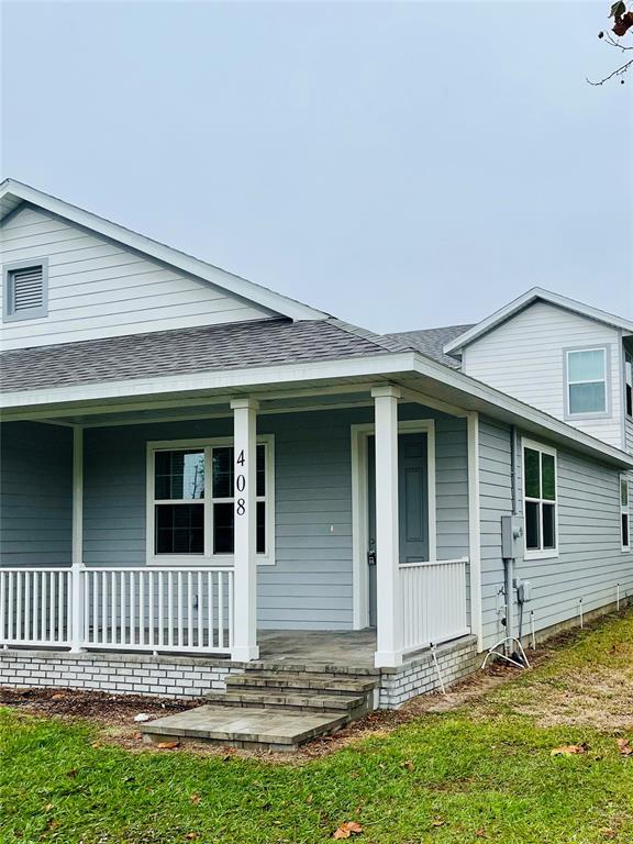 408 South Main Avenue Groveland, FL 34736 - Photo 2 of 15 a view of a house with a yard