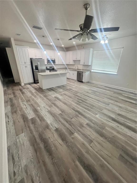 408 South Main Avenue Groveland, FL 34736 - Photo 5 of 15 a view of a storage & utility room