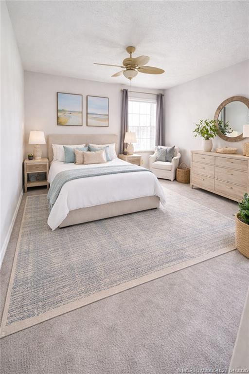 805 Southeast Central Parkway, Unit 16 Stuart, FL 34994 - Photo 7 of 11 a spacious bedroom with a bed and window