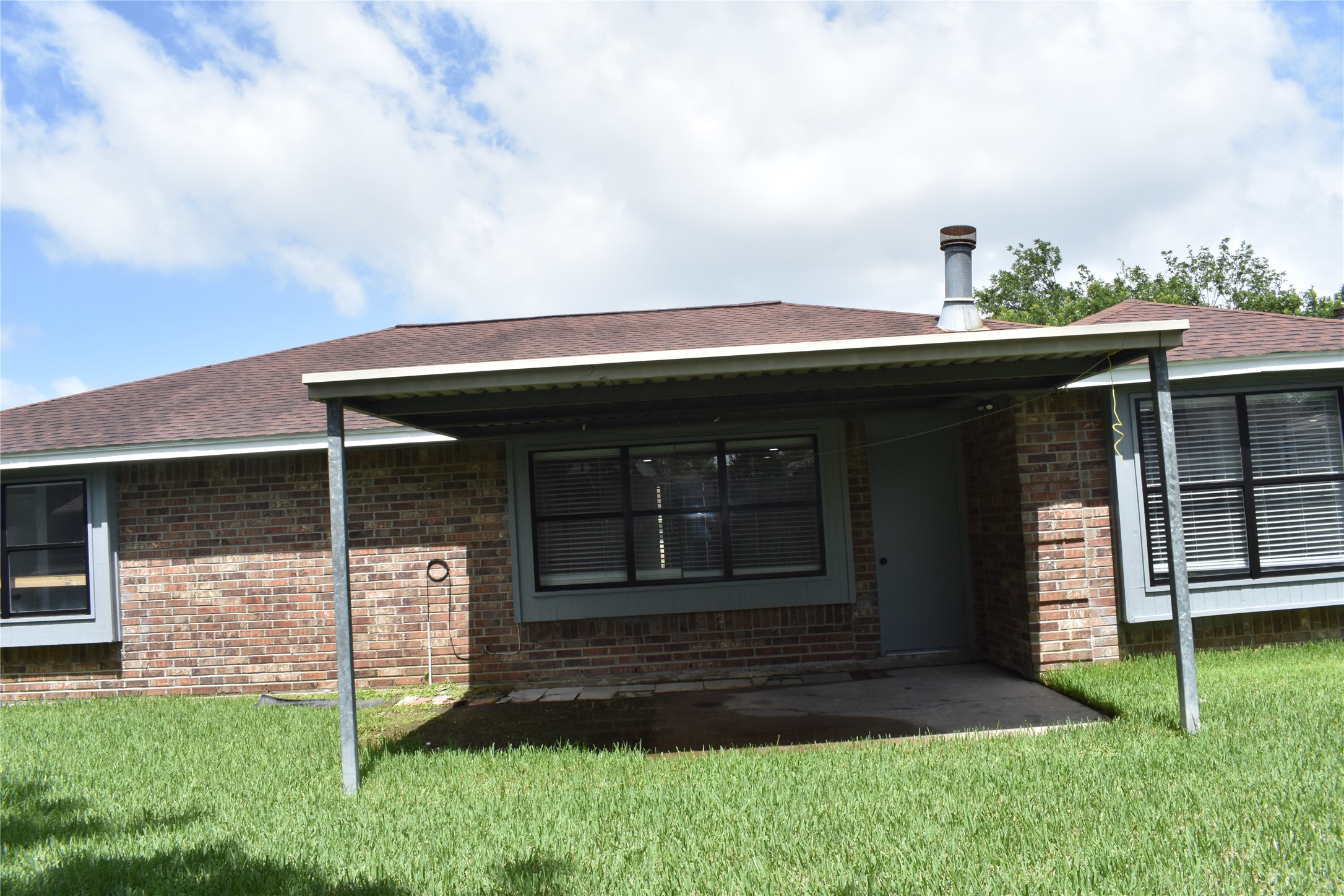 1347 Somercotes Lane Channelview, TX 77530 - Photo 30 of 30 a front view of a house with a garden