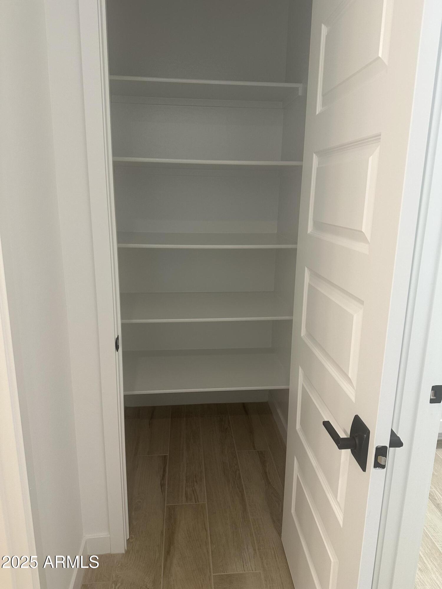3638 East Roland Street Mesa, AZ 85213 - Photo 13 of 37 Lot 27 Hallway storage closet