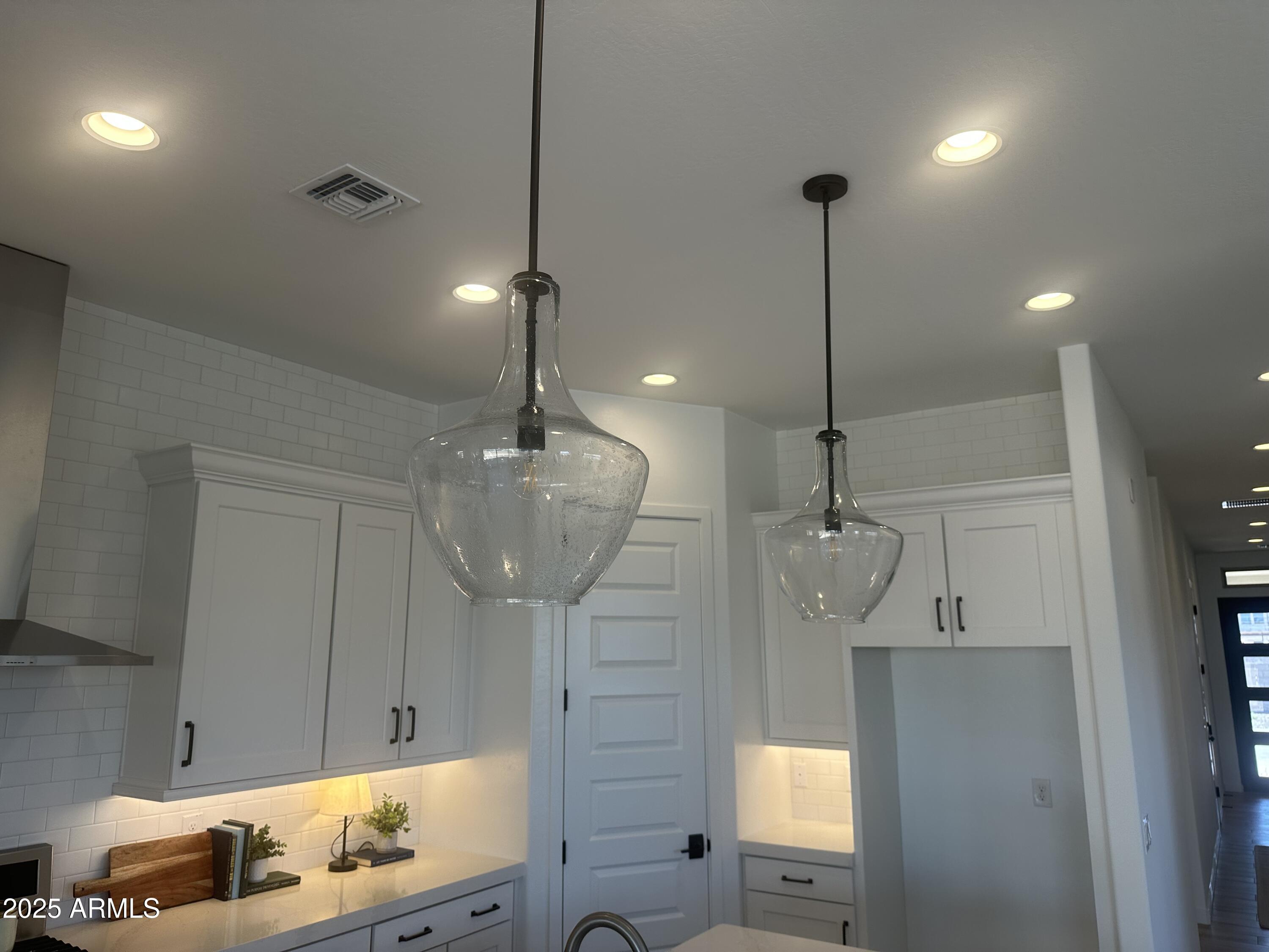 3638 East Roland Street Mesa, AZ 85213 - Photo 21 of 37 Lot 27 Island Pendant lights