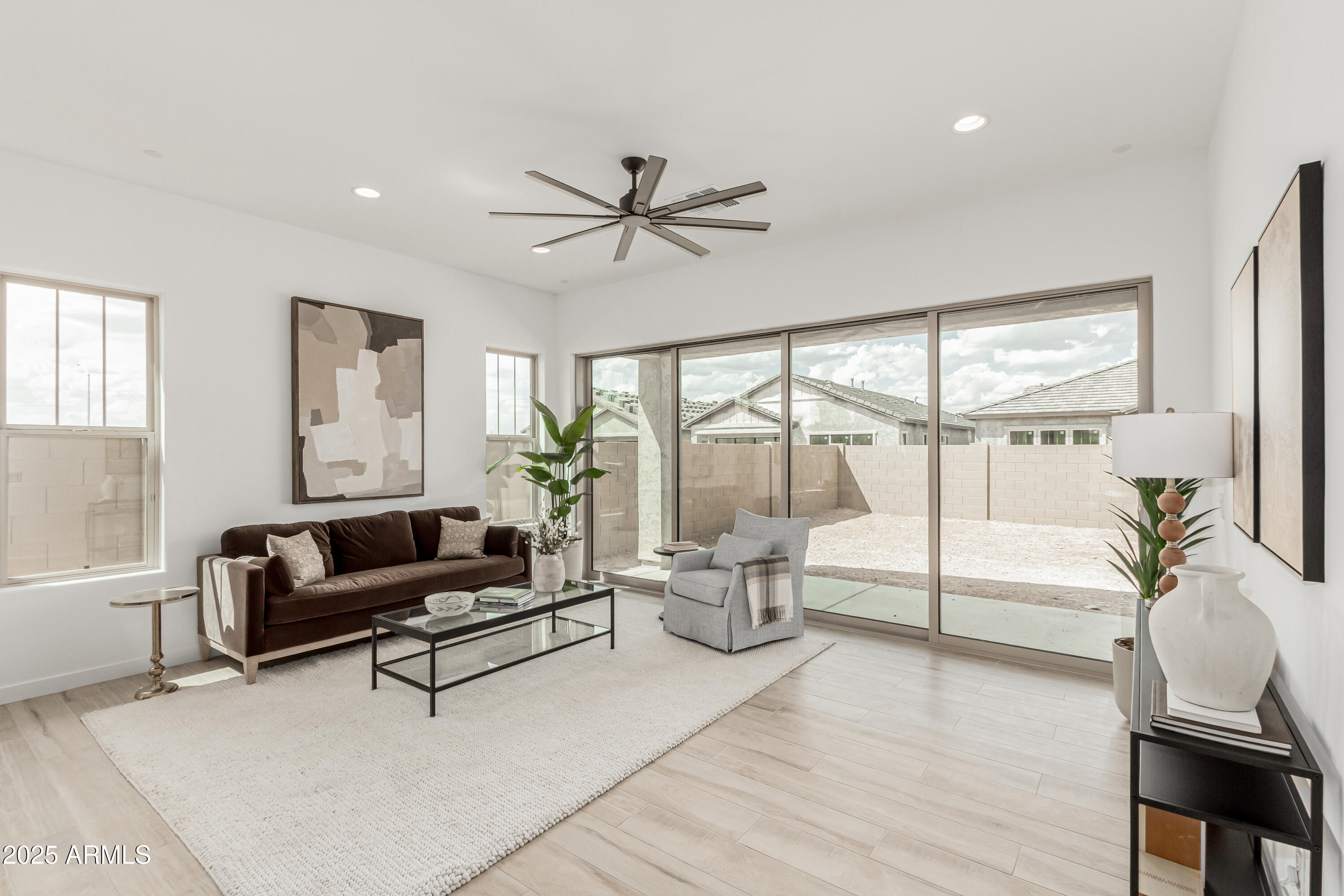 3638 East Roland Street Mesa, AZ 85213 - Photo 26 of 37 27 Great room and disappearing wall of g