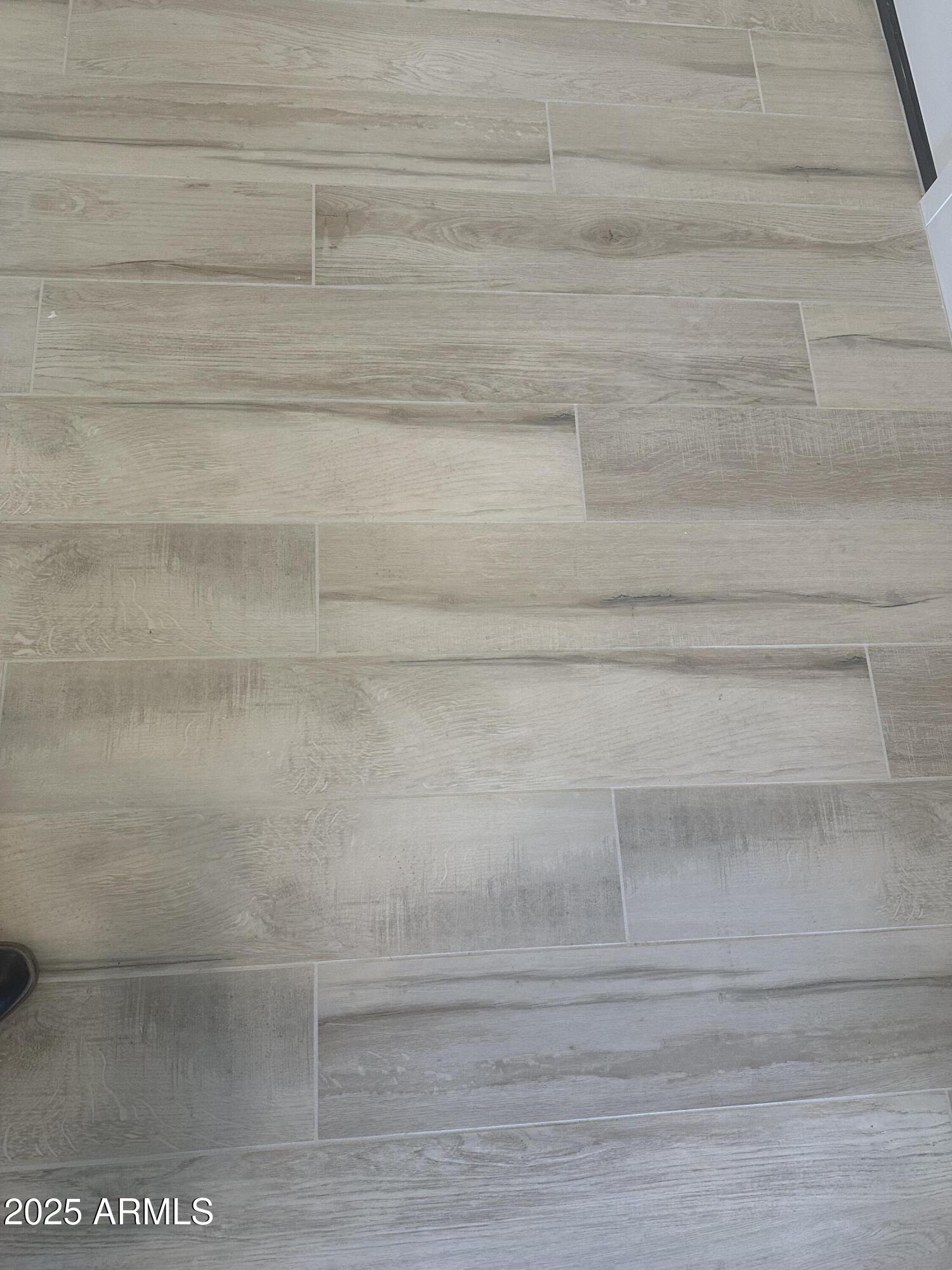 3638 East Roland Street Mesa, AZ 85213 - Photo 8 of 37 Lot 27 All wood look tile throughout