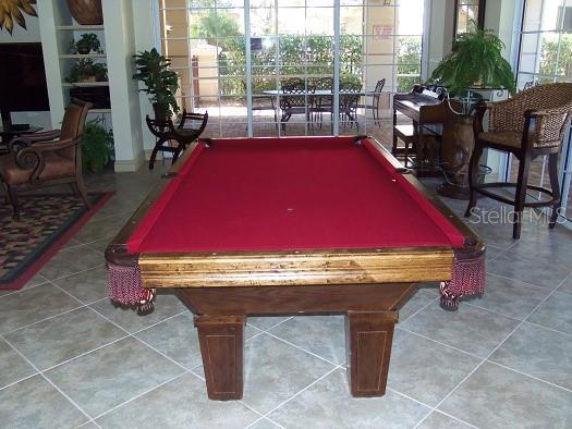 6552 Moorings Point Circle, Unit 102 Lakewood Ranch, FL 34202 - Photo 52 of 57 a room with pool table and windows