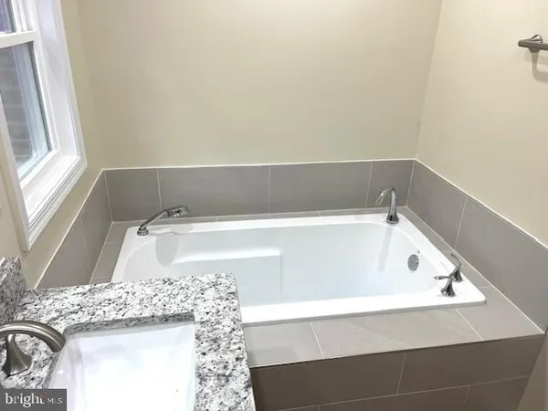 a bathroom with a bathtub