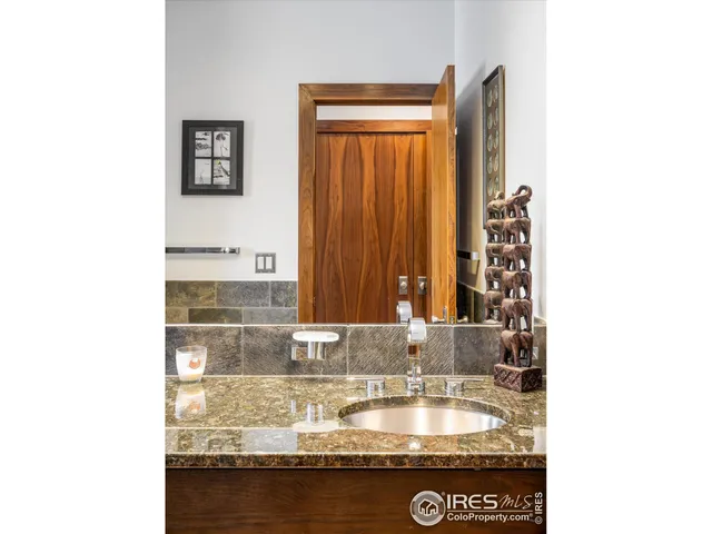 a kitchen with sink and window