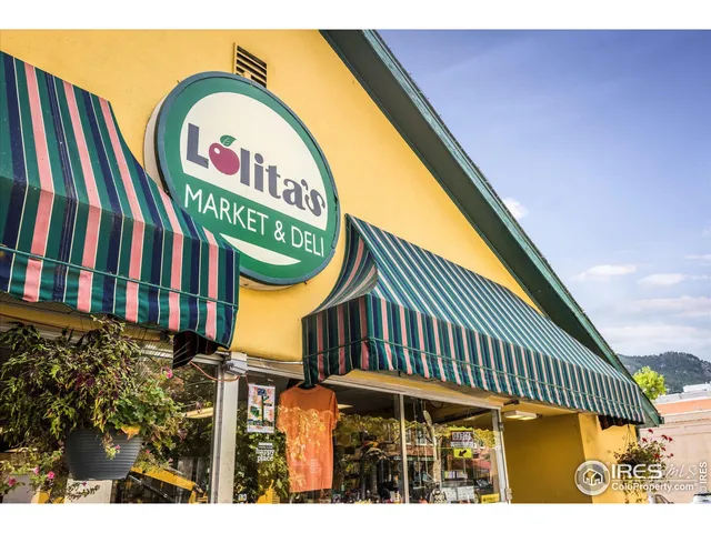 a view of a swimming pool with a bench