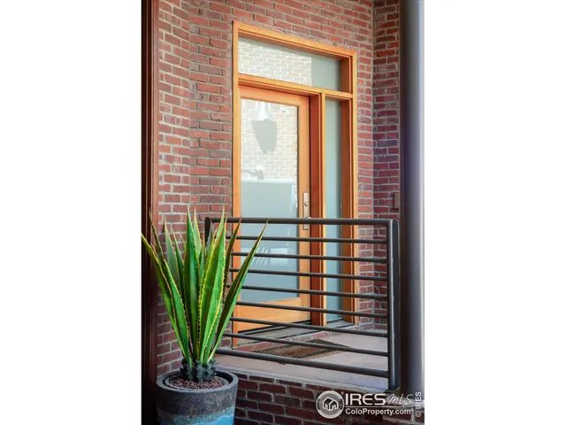 a view of entryway with a window and stairs