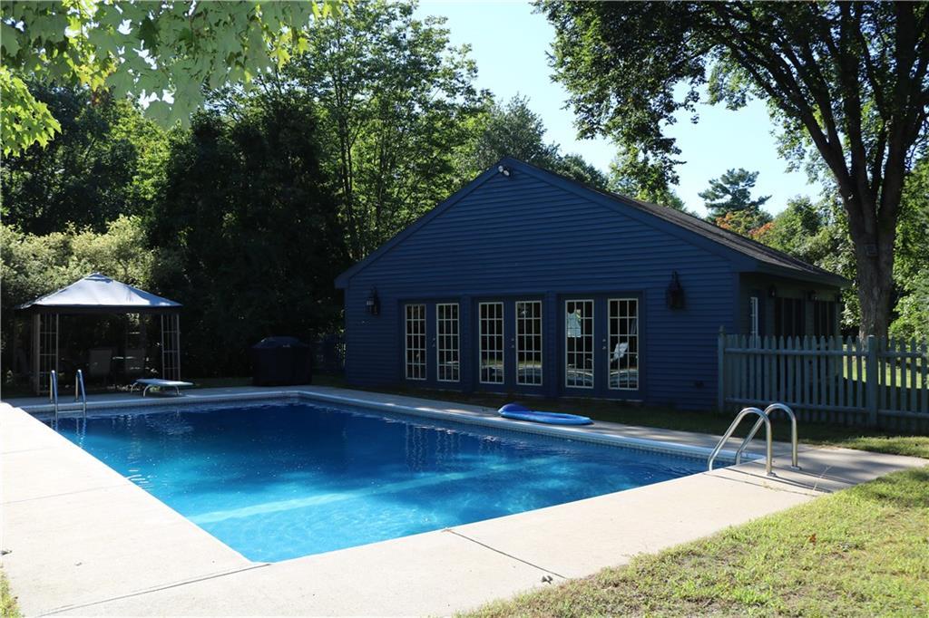 377 Main Street Springvale, ME 04083 - Photo 11 of 31 In-ground pool with patio and Pool house