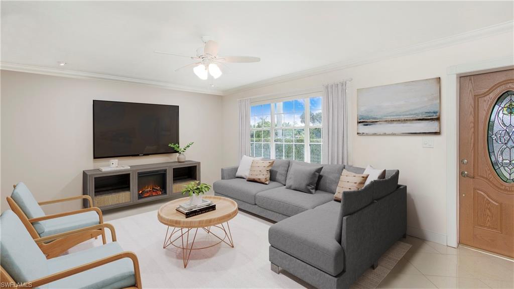 Photo includes reality staging to showcase the possibility of the living room. Design services included with purchase!