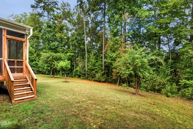a house with trees in the background