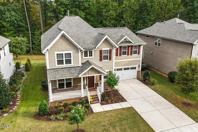 an aerial view of a city with lots of residential buildings