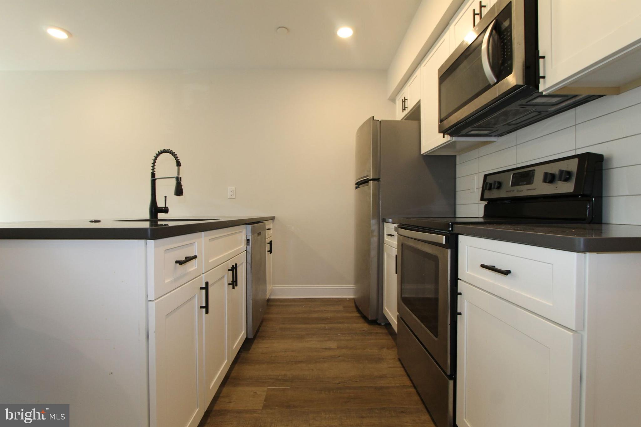 492 Roxborough Avenue, Unit 102 Philadelphia, PA 19128 - Photo 4 of 14