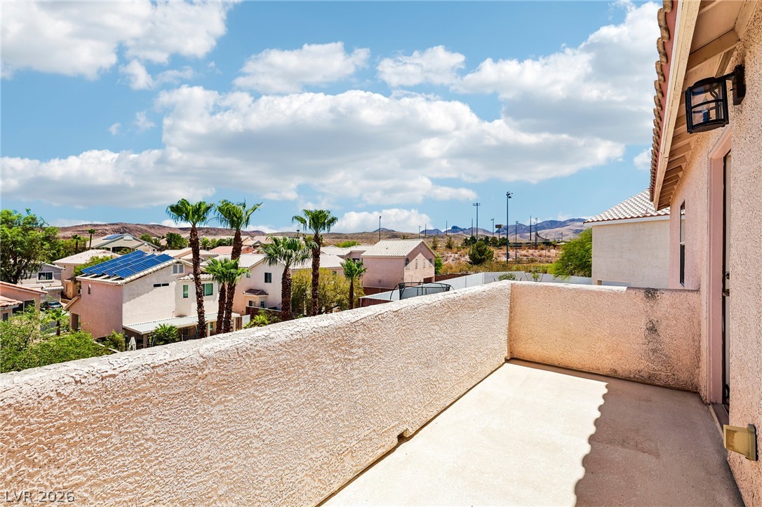 1176 Butternut Ranch Court Henderson, NV 89052 - Photo 46 of 60 A spacious private patio offers picturesque views of the neighborhood and distant mountains.