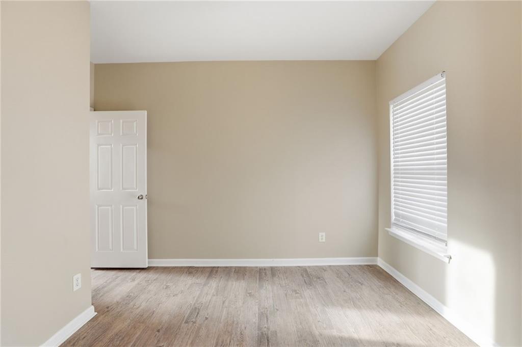 4968 Locherby Drive Fairburn, GA 30213 - Photo 21 of 39 a view of an empty room with a window