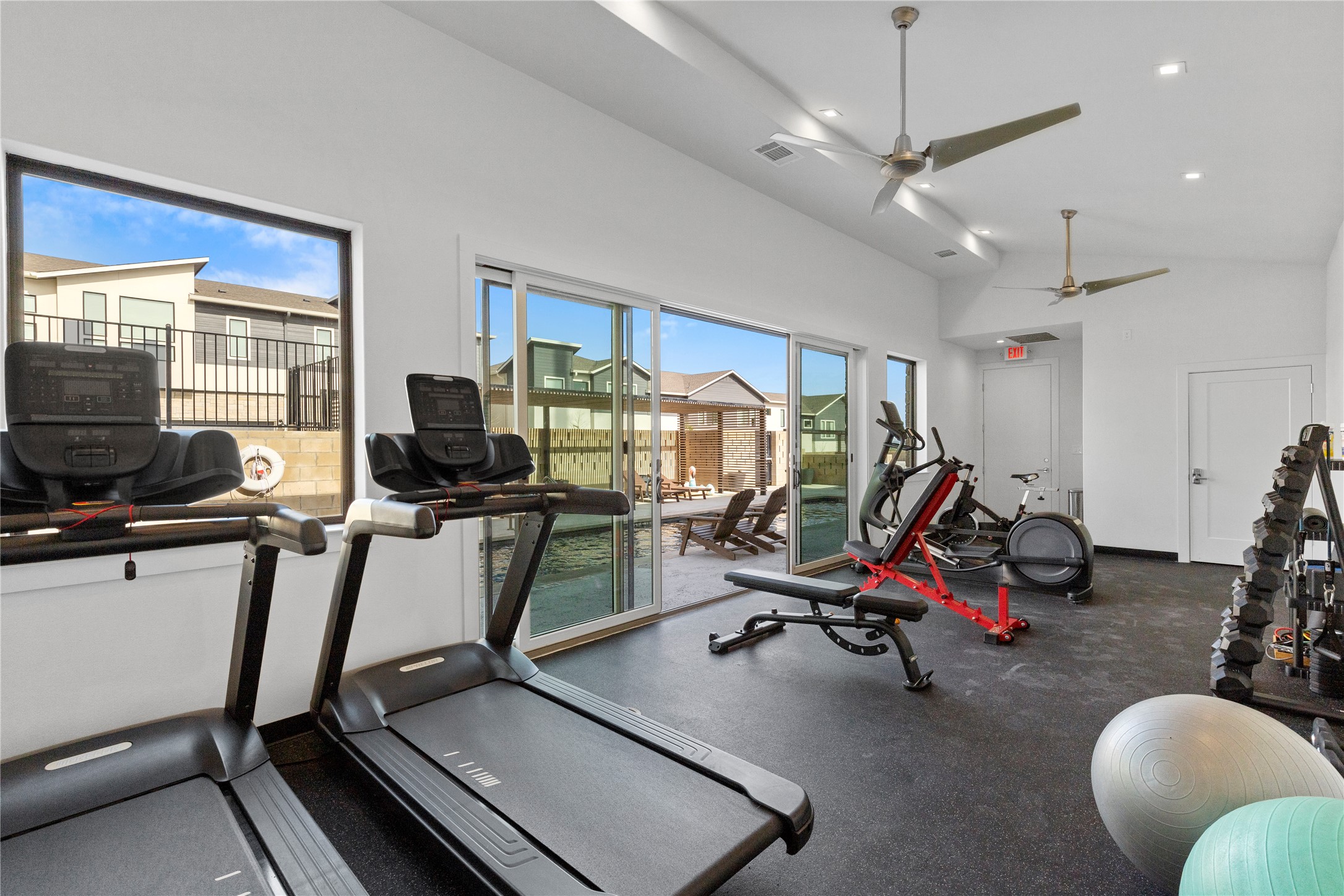 2050 Lohmans Spur Road, Unit 1302 Lakeway, TX 78734 - Photo 5 of 18 a view of a room with gym equipment