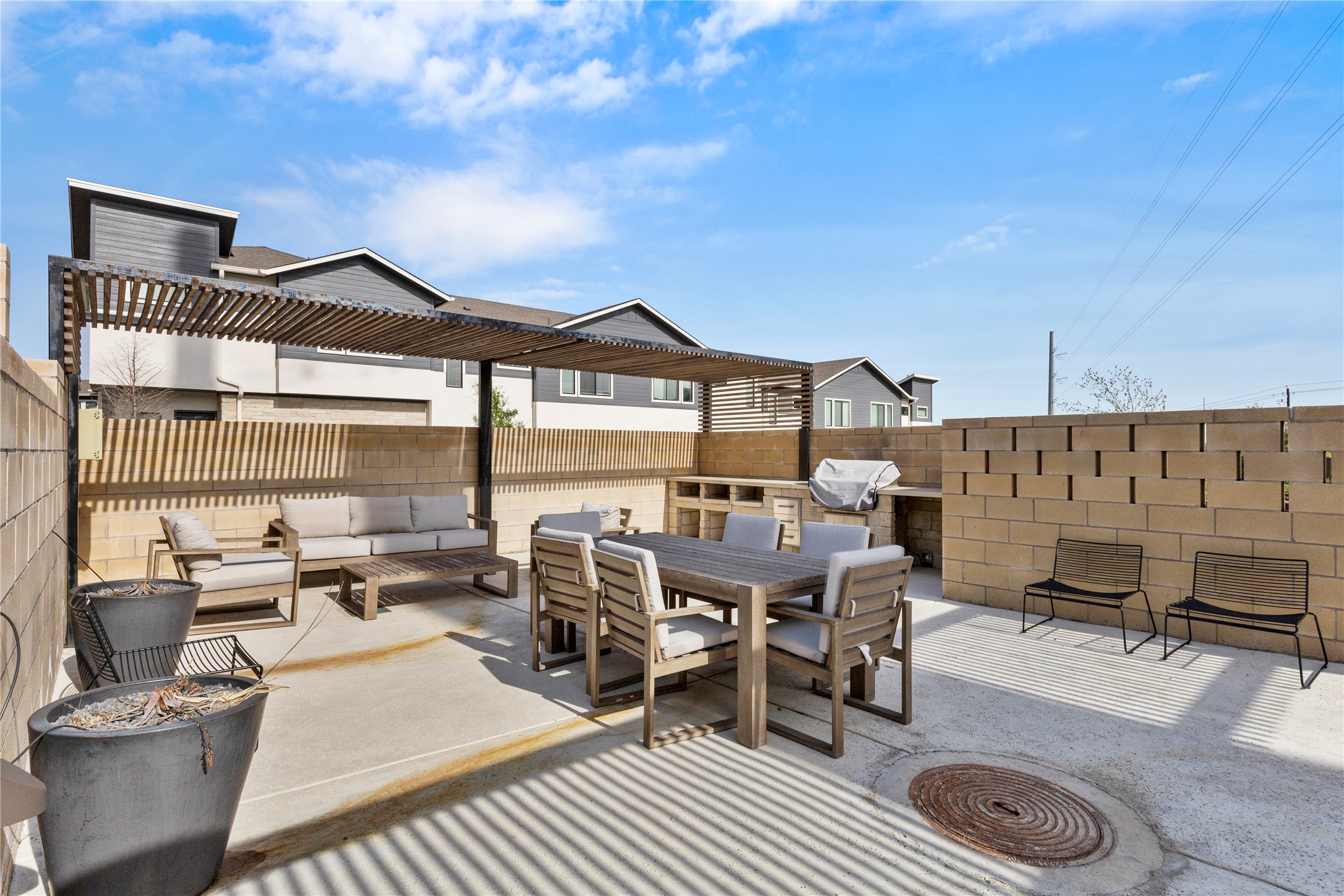 2050 Lohmans Spur Road, Unit 1302 Lakeway, TX 78734 - Photo 10 of 18 a roof deck with table and chairs