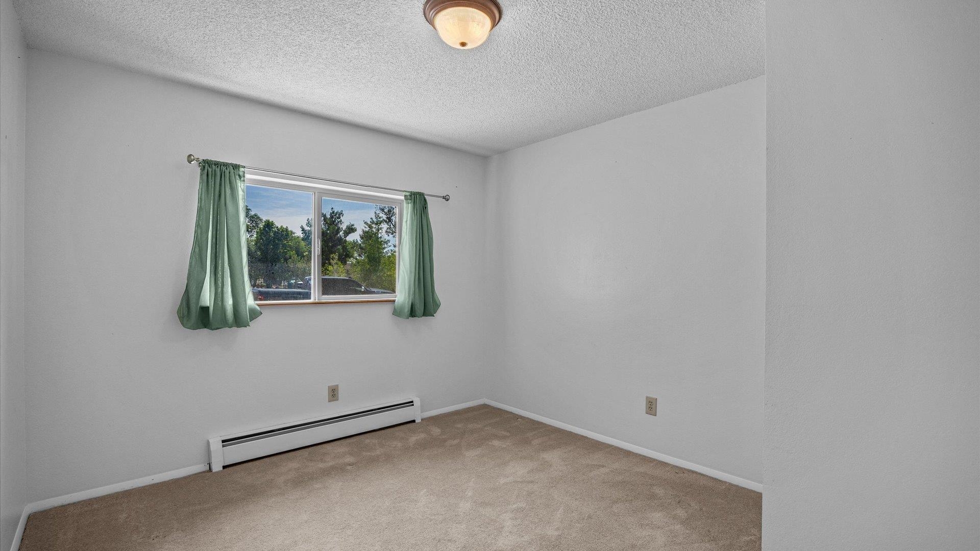543 East Harrison Avenue Fruita, CO 81521 - Photo 18 of 25 an empty room with window