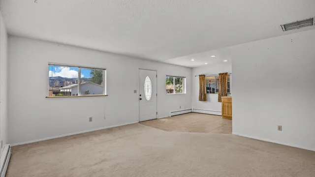 an empty room with windows